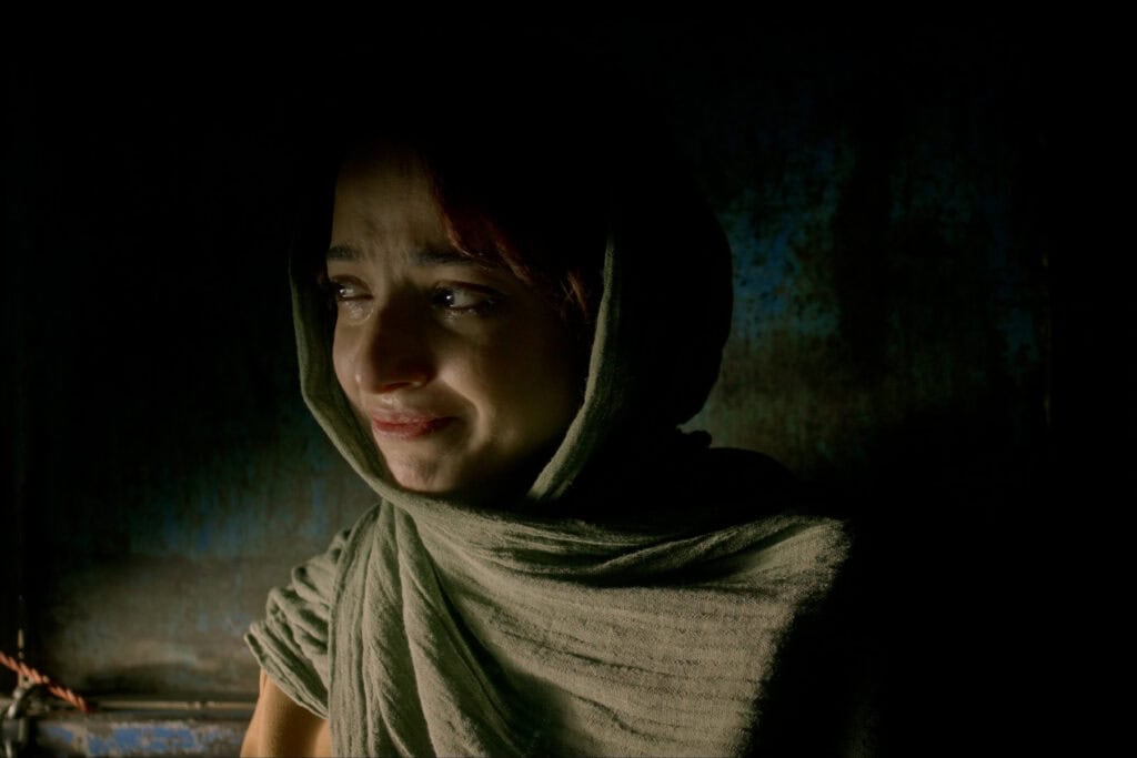 Neda Jebreili in an emotional scene from Ali Zarnegar’s film Cause of Death: Unknown, Iran’s official Oscar submission — a moment of grief and solitude.